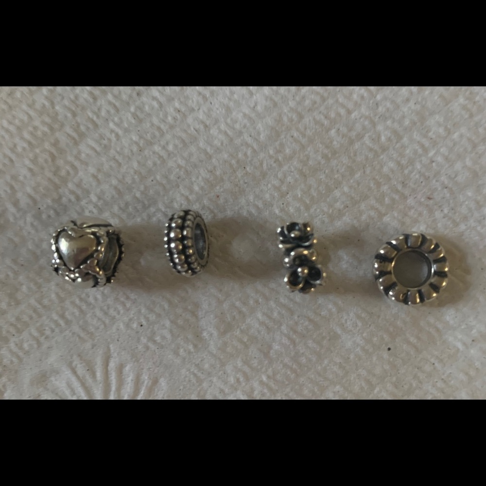Original Pandora spacer charms.  Great deal.